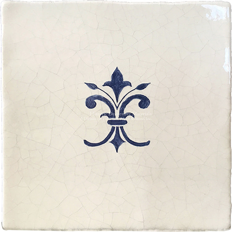 Hand painted blue fleur de lys accent tile inspired from Monet's French kitchen.
