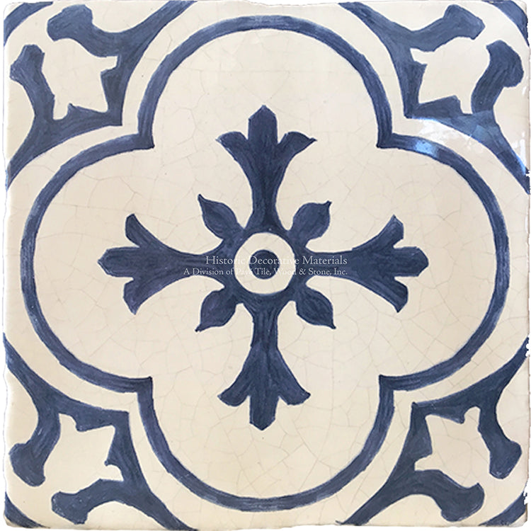 Vintage French blue and white floral accent tiles for elegant kitchens.